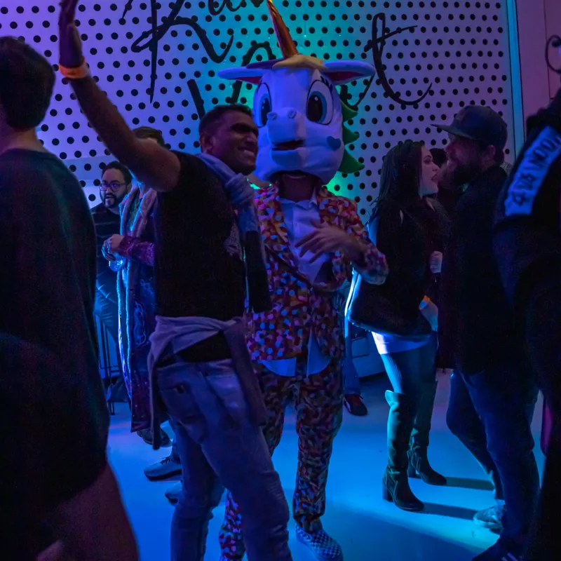 a group of people standing on a stage