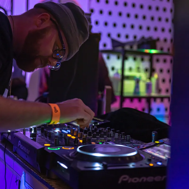 a man standing in front of a computer
