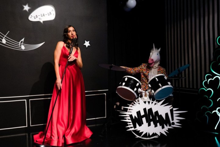 a person standing on a stage