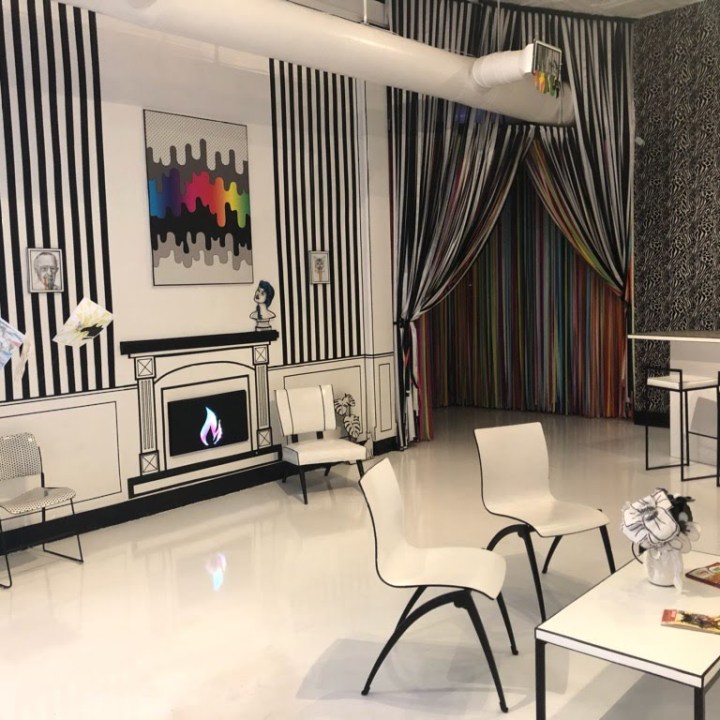 a room with a desk and chair