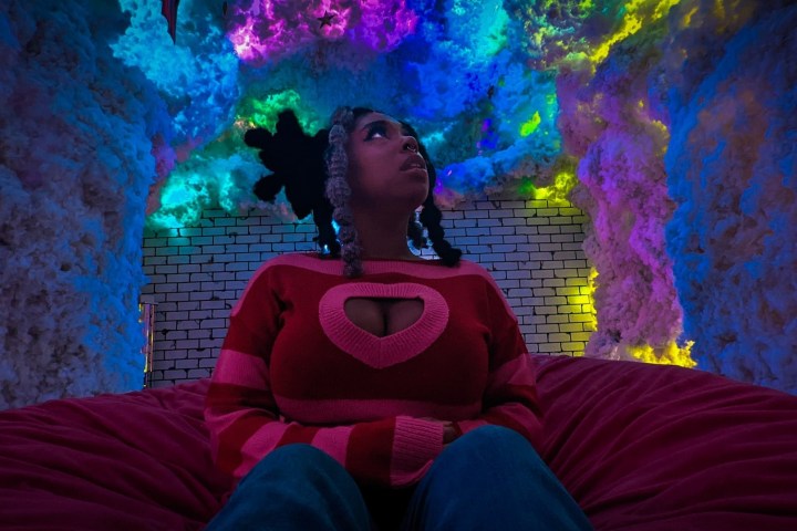 a person sitting on a bed